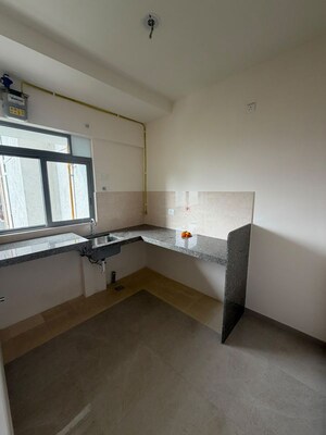 Kitchen in 1 BHK Apartment at Piramal Vaikunth Cluster 2, Balkum Pada – for Rent