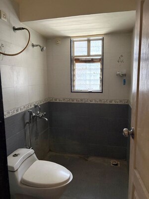 Bathroom in 3 BHK Apartment at Venkatesh Flora Phase II, Mundhwa – for Rent