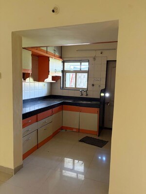Kitchen in 3 BHK Apartment at Venkatesh Flora Phase II, Mundhwa – for Rent