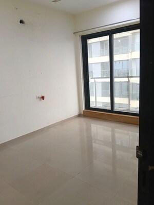 Room in 2 BHK Apartment at Rustomjee Elanza, Malad West – for Rent