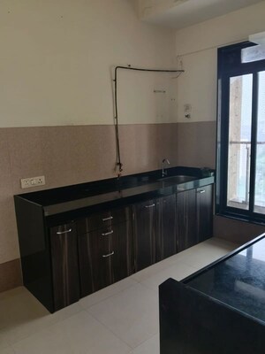 Kitchen in 2 BHK Apartment at Rustomjee Elanza, Malad West – for Rent