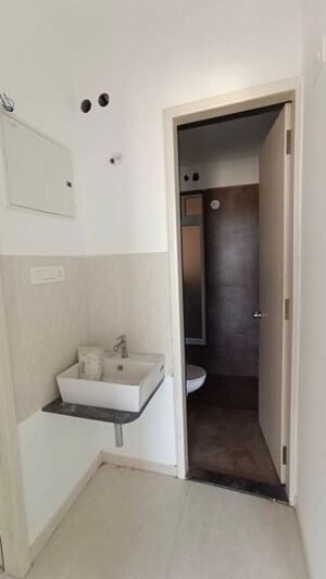 Bathroom in 3 BHK Apartment at Sukhwani Kingsley, Thergaon – for Rent