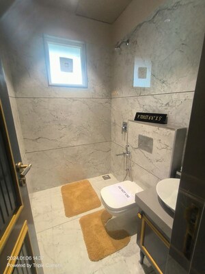 Bathroom in 4 BHK Apartment at Courtyard Trilogy, Sevasi – for Sale