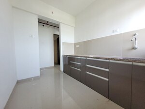 Kitchen in 1 BHK Apartment at Puranik City Reserva, Ghodbunder Road – for Rent