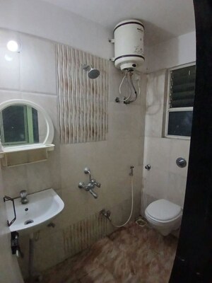 Bathroom in 2 BHK Apartment at Duville Riverdale Grove, Kharadi – for Rent