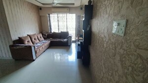 Living Room in 1 BHK Apartment at Raunak Unnathi Greens, Kasarvadavali – for Rent