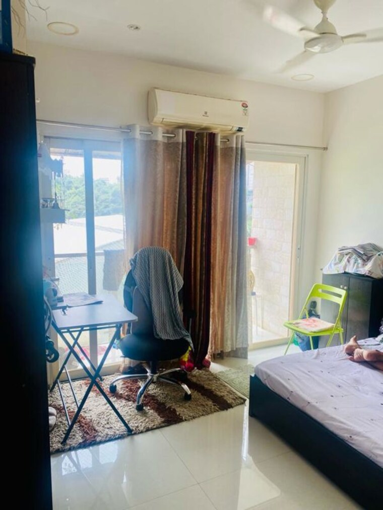 Living Room, royal-palms-garden-view 2 Bedroom 810 Sq.Ft. Apartment In Goregaon East Mumbai 10646907