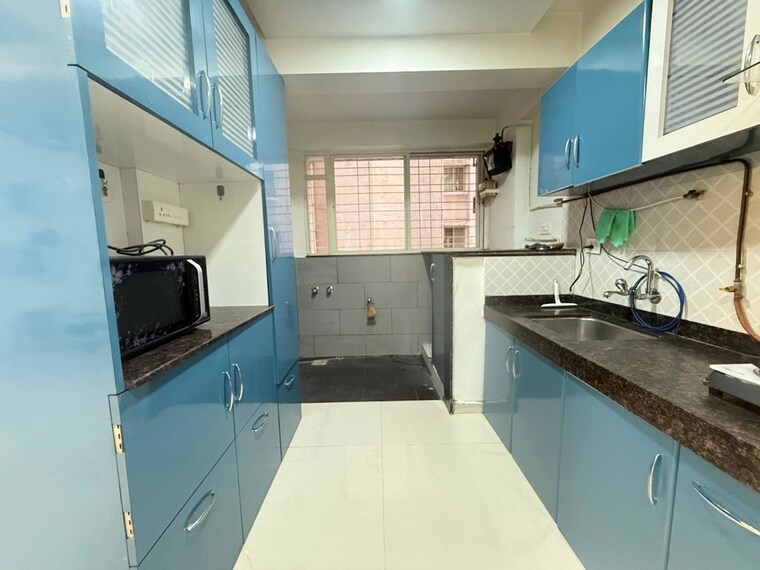 Kitchen, sun-universe-apartment 2 Bedroom 1000 Sq.Ft. Apartment In Narhe Pune 10648693
