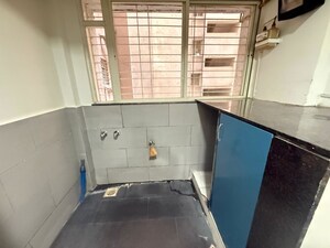 Kitchen in 2 BHK Apartment at Sun Universe Apartment, Narhe – for Rent