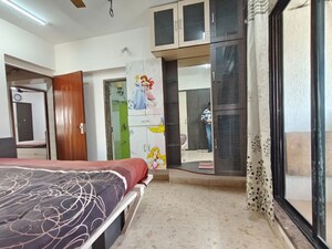Bedroom in 3 BHK Apartment at Swastik Regalia, Waghbil – for Rent