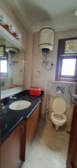 Bathroom in 3 BHK Builder Floor at Greater Kailash – for Rent