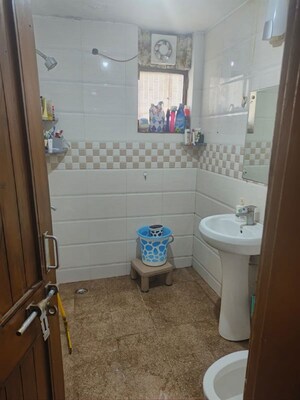 Bathroom in 4 BHK Apartment at Sector 6 Dwarka – for Rent