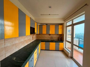 Kitchen in 3 BHK Apartment at Nirala Greenshire, Sector 2 Greater Noida – for Rent