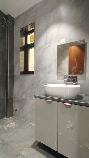 Bathroom in 4 BHK Builder Floor at Ansal API Esencia, Sector 67 – for Rent