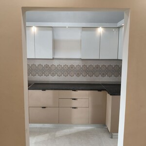Kitchen in 2 BHK Apartment at Mangalya Novena Green, Tech Zone 4 Greater Noida – for Rent