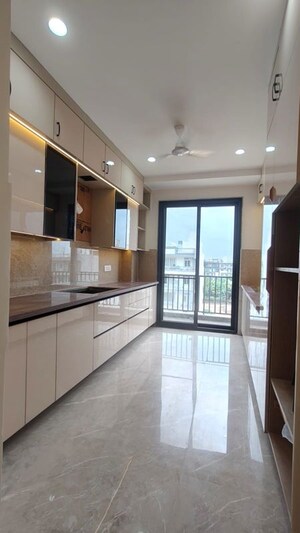 Kitchen in 4 BHK Builder Floor at Ansal API Esencia, Sector 67 – for Rent