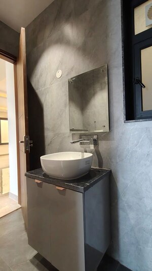Bathroom in 4 BHK Builder Floor at Ansal API Esencia, Sector 67 – for Rent