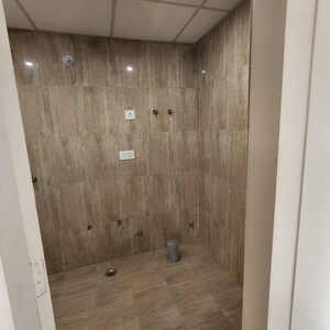 Bathroom in 3 BHK Apartment at Mangalya Novena Green, Tech Zone 4 Greater Noida – for Rent