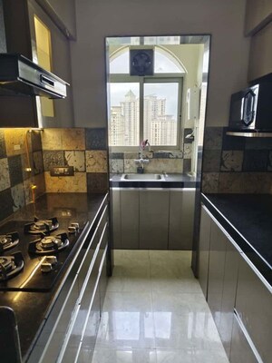 Kitchen in 2 BHK Apartment at Hiranandani Athena, Ghodbunder Road – for Rent