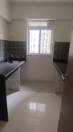Team Area in 1 BHK Apartment at Lodha Amara, Kolshet Road – for Sale