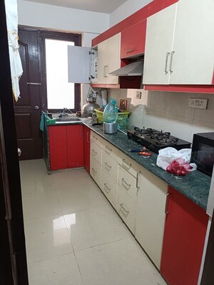 Kitchen in 3 BHK Apartment at Aryavrat Buckingham Court British Park, Indus Towne – for Sale