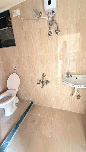 Bathroom in 2 BHK Apartment at Shamik Marvel, Vile Parle East – for Rent