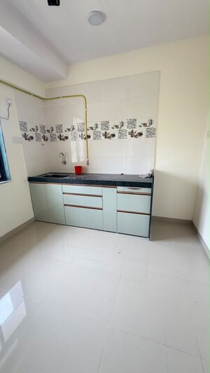 Kitchen in 2 BHK Apartment at Shamik Marvel, Vile Parle East – for Rent