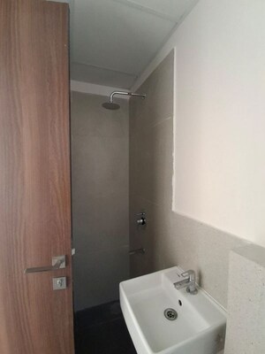 Bathroom in 1.5 BHK Apartment at Piramal Vaikunth, Balkum Pada – for Rent
