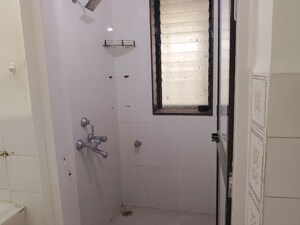 Bathroom in 1 BHK Apartment at Accord CHS, Andheri East – for Rent