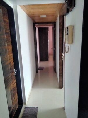 Building Lobby in 2 BHK Apartment at Highland Tower, Lokhandwala – for Rent