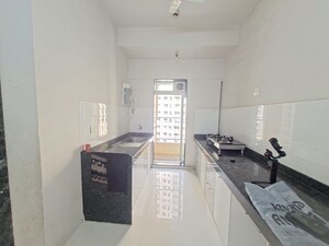 Kitchen in 2 BHK Apartment at Rustomjee Azziano Wing K, Thane West – for Sale