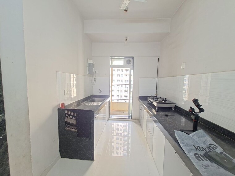 Kitchen, rustomjee-azziano-wing-k 2 Bedroom 691 Sq.Ft. Apartment In Thane West Thane 10649138