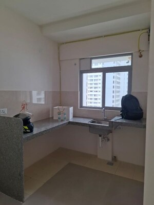 Kitchen in 1.5 BHK Apartment at Piramal Vaikunth, Balkum Pada – for Rent