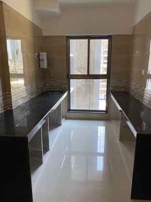 Kitchen in 5 BHK Apartment at Raj Infinia, Malad West – for Sale