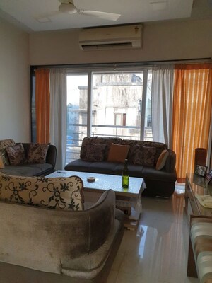 Living Room in 2 BHK Apartment at Forishna Nav Chetna, Santacruz West – for Rent