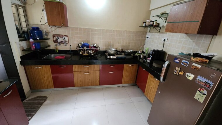 Kitchen, om-faith 2 Bedroom 1011 Sq.Ft. Apartment In Balewadi Pune 10649199
