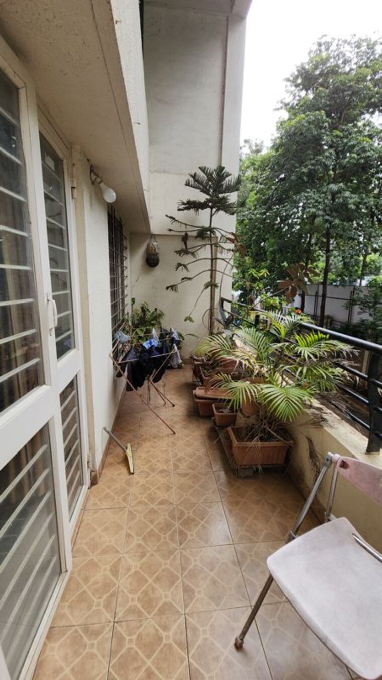 Balcony, om-faith 2 Bedroom 1011 Sq.Ft. Apartment In Balewadi Pune 10649199