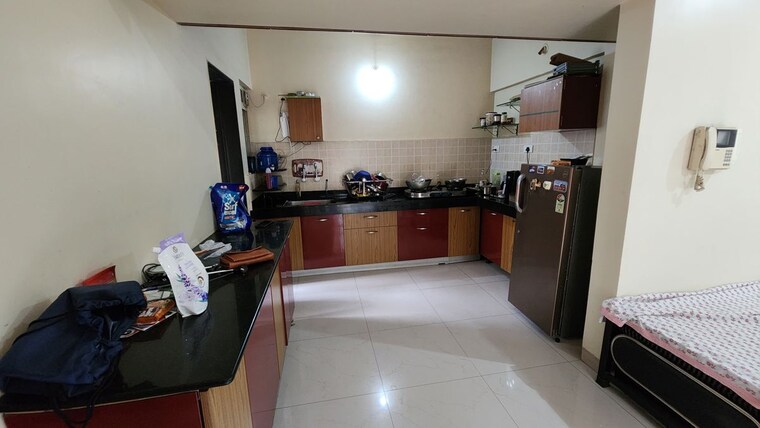 Kitchen, om-faith 2 Bedroom 1011 Sq.Ft. Apartment In Balewadi Pune 10649199