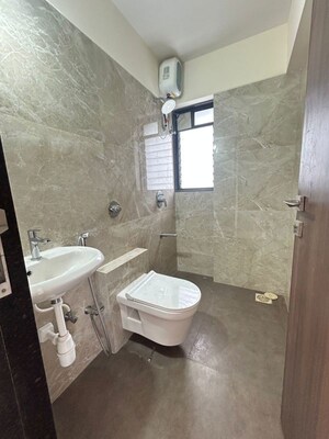 Bathroom in 2 BHK Apartment at Sigma Pearl, Khar West – for Rent