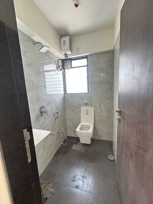 Bathroom in 2 BHK Apartment at Sigma Pearl, Khar West – for Rent