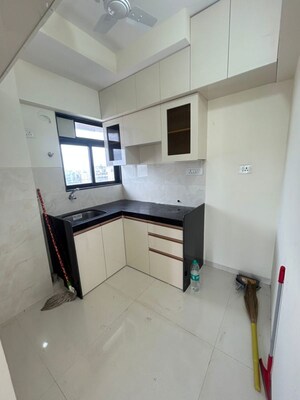 Kitchen in 2 BHK Apartment at Sigma Pearl, Khar West – for Rent