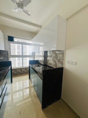 Kitchen in 1 BHK Apartment at Group Satellite Elegance, Goregaon East – for Sale