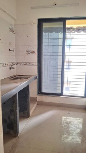 Kitchen in 1 BHK Apartment at MGM Residency, Ulwe Sector 19 – for Rent