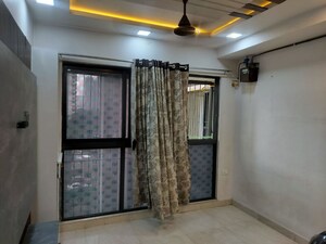 Living Room in 1 BHK Apartment at Lodha Crown Quality Homes, Majiwada – for Rent
