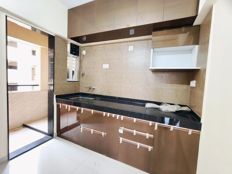 Kitchen, vertical-alcinia 2 Bedroom 724 Sq.Ft. Apartment In Mohammadwadi Pune 10649319