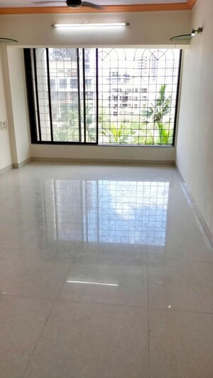 Room in 2 BHK Apartment at Shah Arcade II, Malad East – for Rent