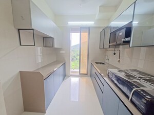Kitchen in 2 BHK Apartment at USD Unique Vistas, Manpada – for Rent