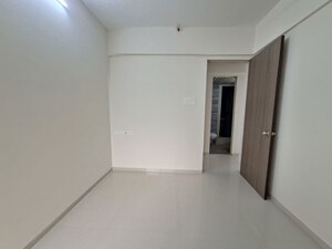 Bedroom in 2 BHK Apartment at USD Unique Vistas, Manpada – for Rent