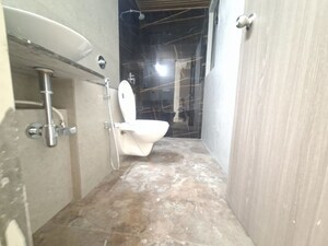 Bathroom in 2 BHK Apartment at USD Unique Vistas, Manpada – for Rent