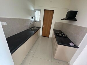 Kitchen in 2 BHK Apartment at Gera Planet Of Joy, Kharadi – for Sale